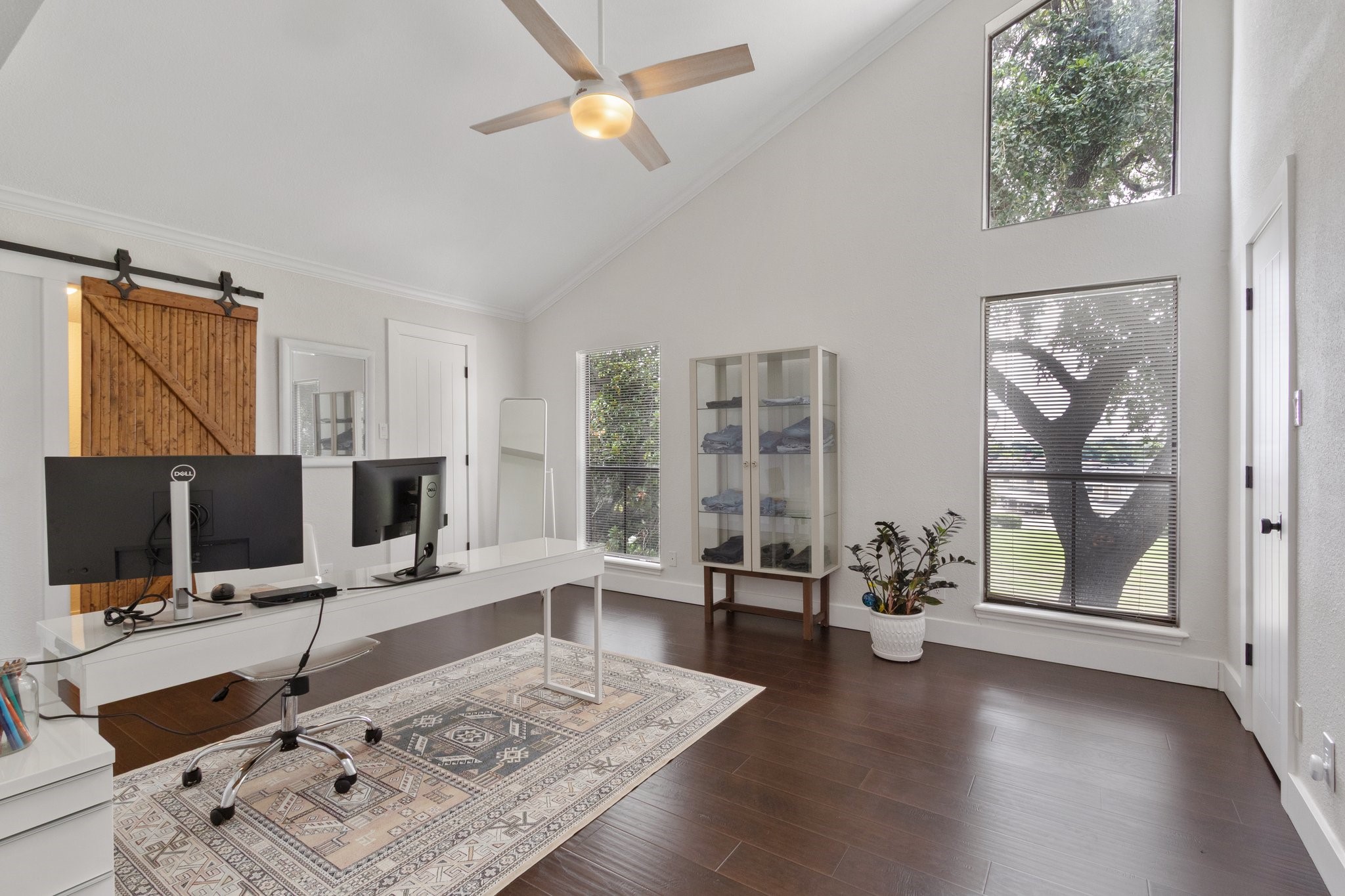 198 April Point Drive North Conroe, TX 77356 - Photo 28 of 34 a living room with furniture and a flat screen tv