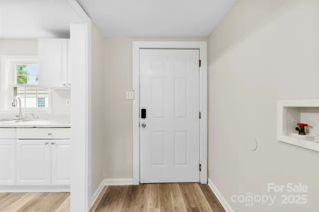 a view of kitchen with wooden floor