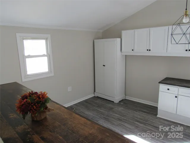 a view of utility room and closet area