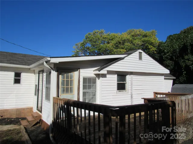 a front view of a house with yard