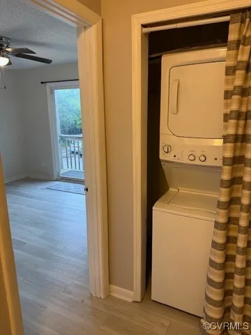 a view of balcony with wooden floor