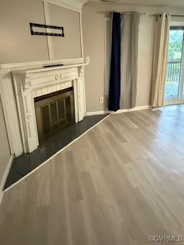 a view of a livingroom with a fireplace