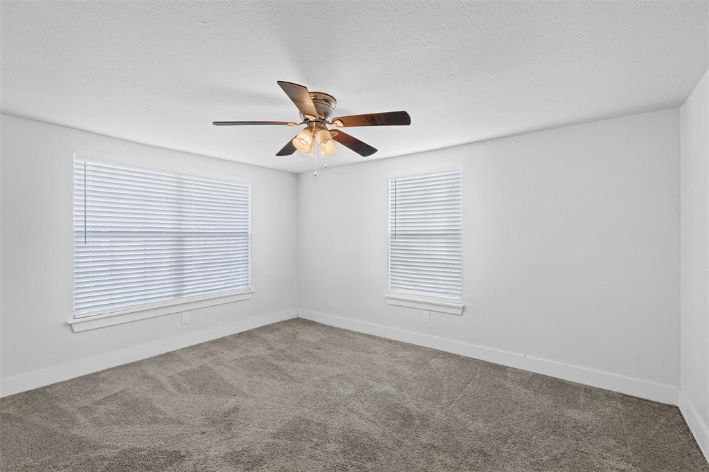 3514 Larry Street Rowlett, TX 75088 - Photo 20 of 27 a view of an empty room with a window