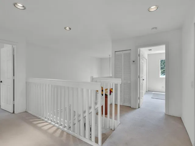 a bathroom with a sink toilet and a mirror