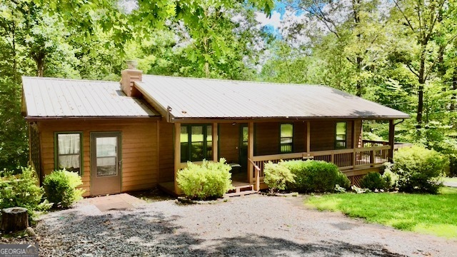 22 Ridge Haven Drive Cleveland, GA 30528 - Photo 1 of 1 a view of a house with potted plants and a large tree