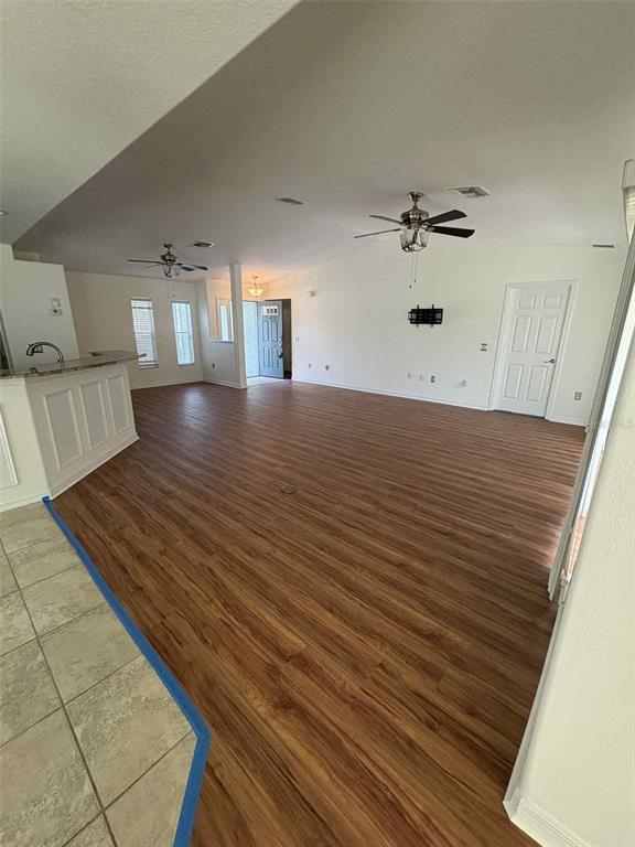 15813 Southwest 16th Avenue Road Ocala, FL 34473 - Photo 14 of 33 a view of empty room with wooden floor