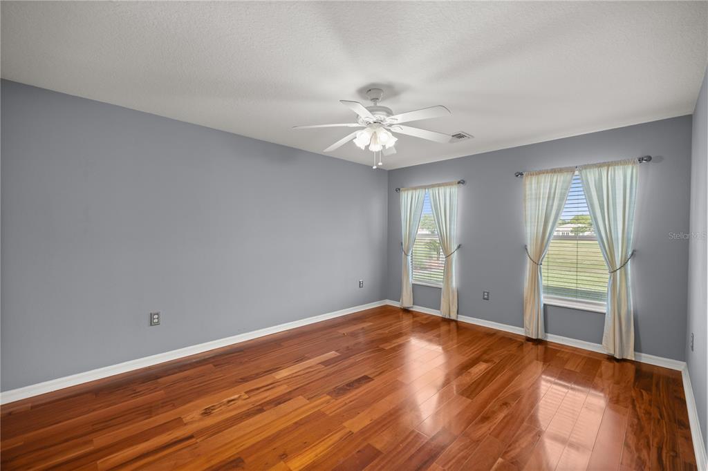 15813 Southwest 16th Avenue Road Ocala, FL 34473 - Photo 16 of 33 wooden floor in an empty room with a window