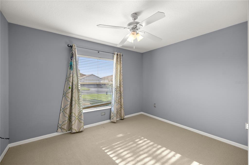 15813 Southwest 16th Avenue Road Ocala, FL 34473 - Photo 22 of 33 an empty room with windows and closet