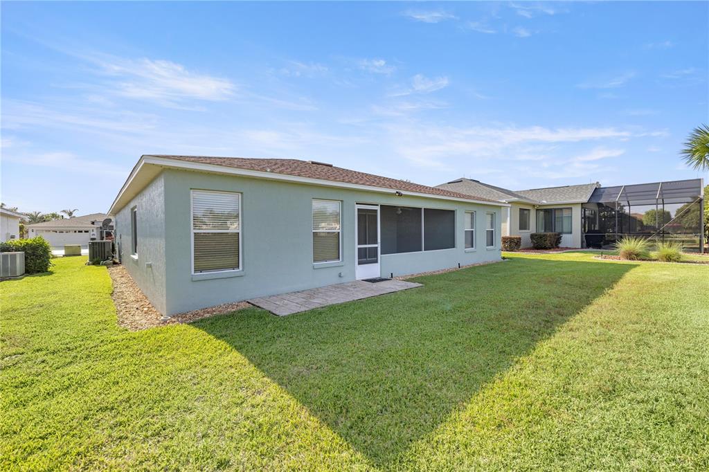 15813 Southwest 16th Avenue Road Ocala, FL 34473 - Photo 28 of 33 a front view of house with yard and green space