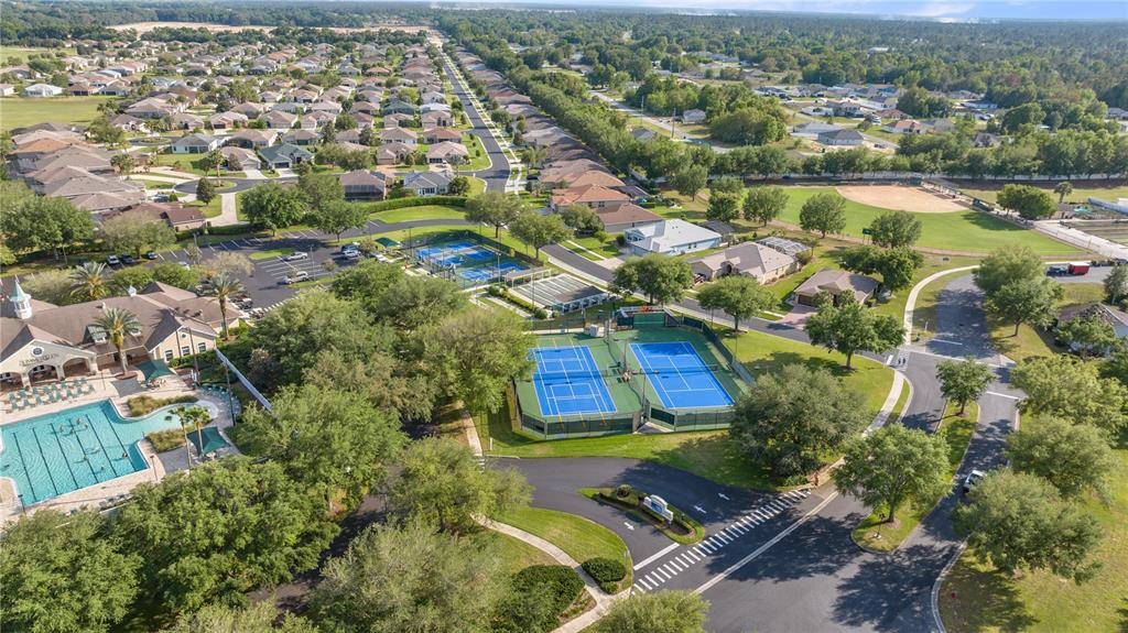 15813 Southwest 16th Avenue Road Ocala, FL 34473 - Photo 32 of 33 an aerial view of residential houses with outdoor space