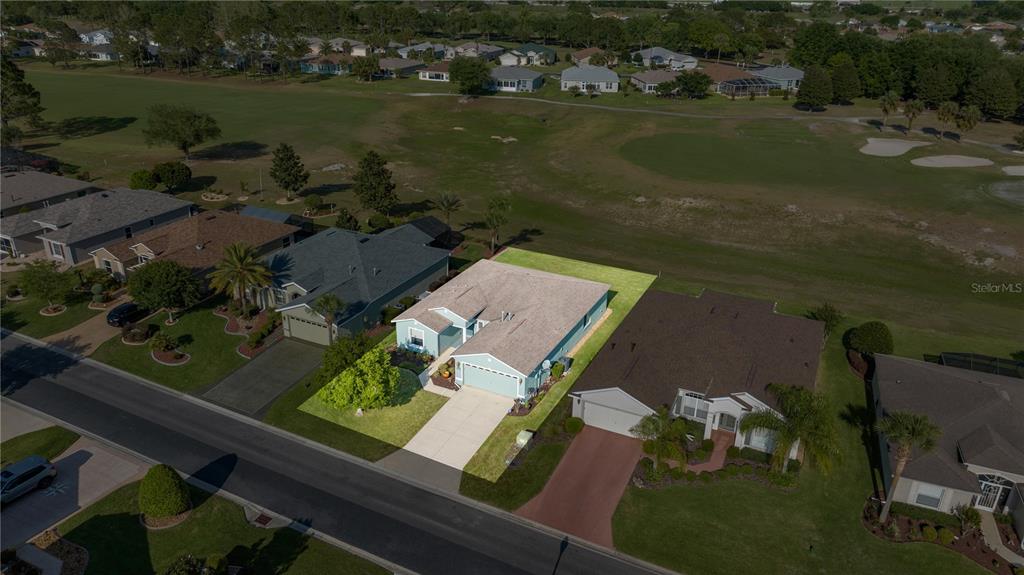 15813 Southwest 16th Avenue Road Ocala, FL 34473 - Photo 5 of 33 an aerial view of a house with yard lake and lake view