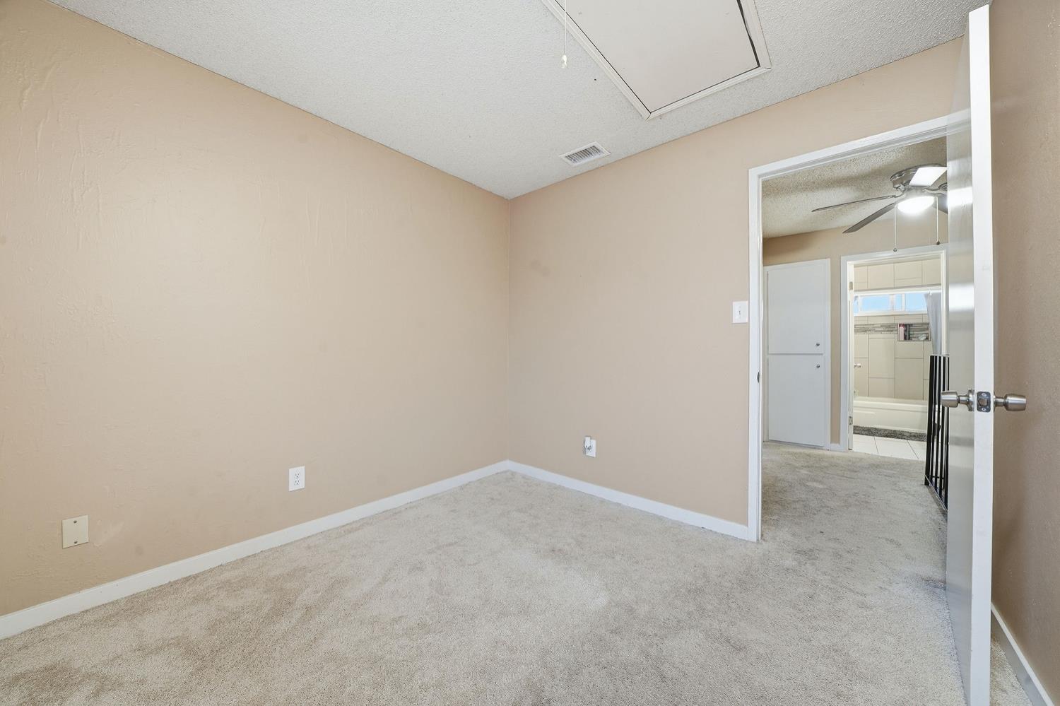 27 Omaha Court Sacramento, CA 95823 - Photo 24 of 43 an empty room with closet and a bathroom