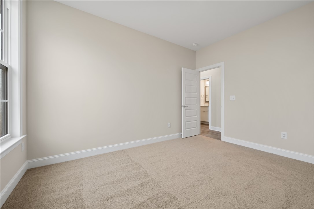 112 Oak Grove Road Norris, SC 29667 - Photo 18 of 19 This inviting bedroom provides a comfortable retreat with plush carpeting and ample natural light.