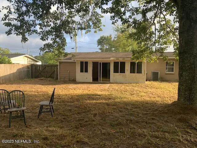 a house view with outdoor seating space