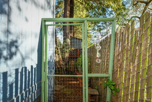 a backyard of a house with lots of green space