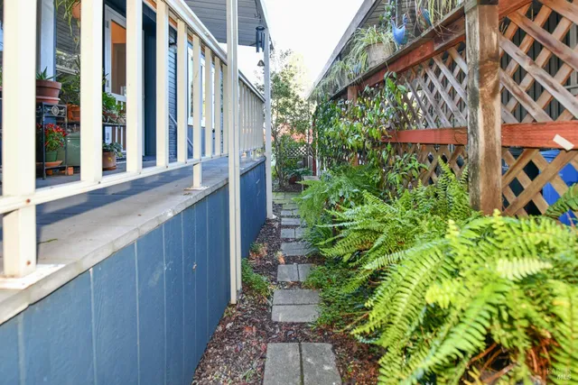 a view of sitting area in front of house