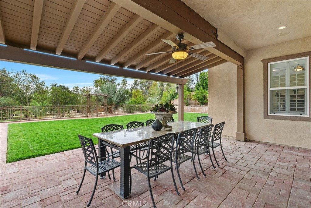 13337 Hunt Club Drive Rancho Cucamonga, CA 91739 - Photo 33 of 45 Covered patio with ceiling fan