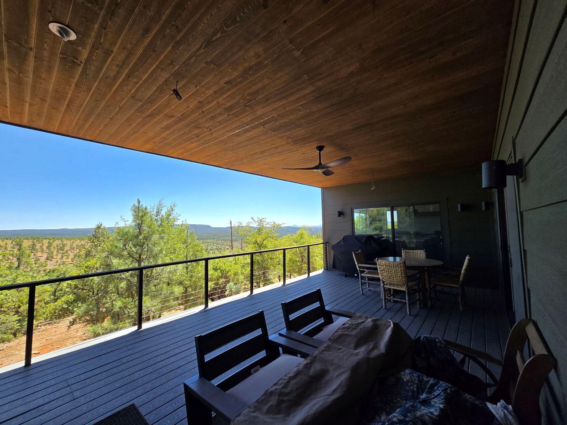 240 Rockinghorse Bend Road Payson, AZ 85541 - Photo 37 of 53 a view of a chairs and table in patio with a patio