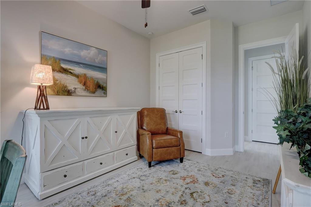 6297 Antigua Way Naples, FL 34113 - Photo 23 of 43 a living room with furniture