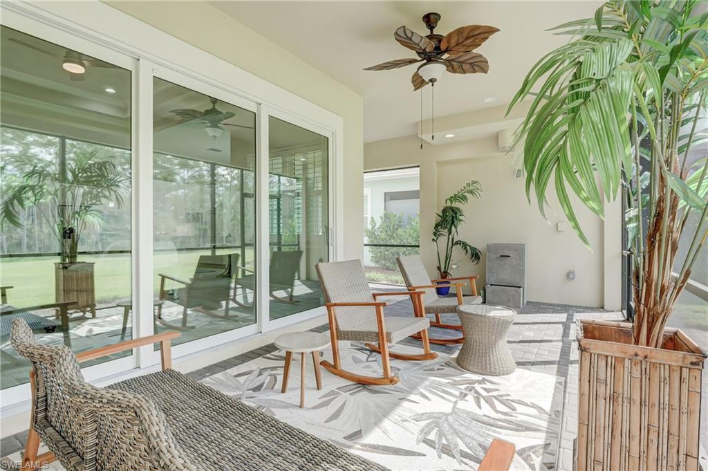 6297 Antigua Way Naples, FL 34113 - Photo 26 of 43 a living room with furniture