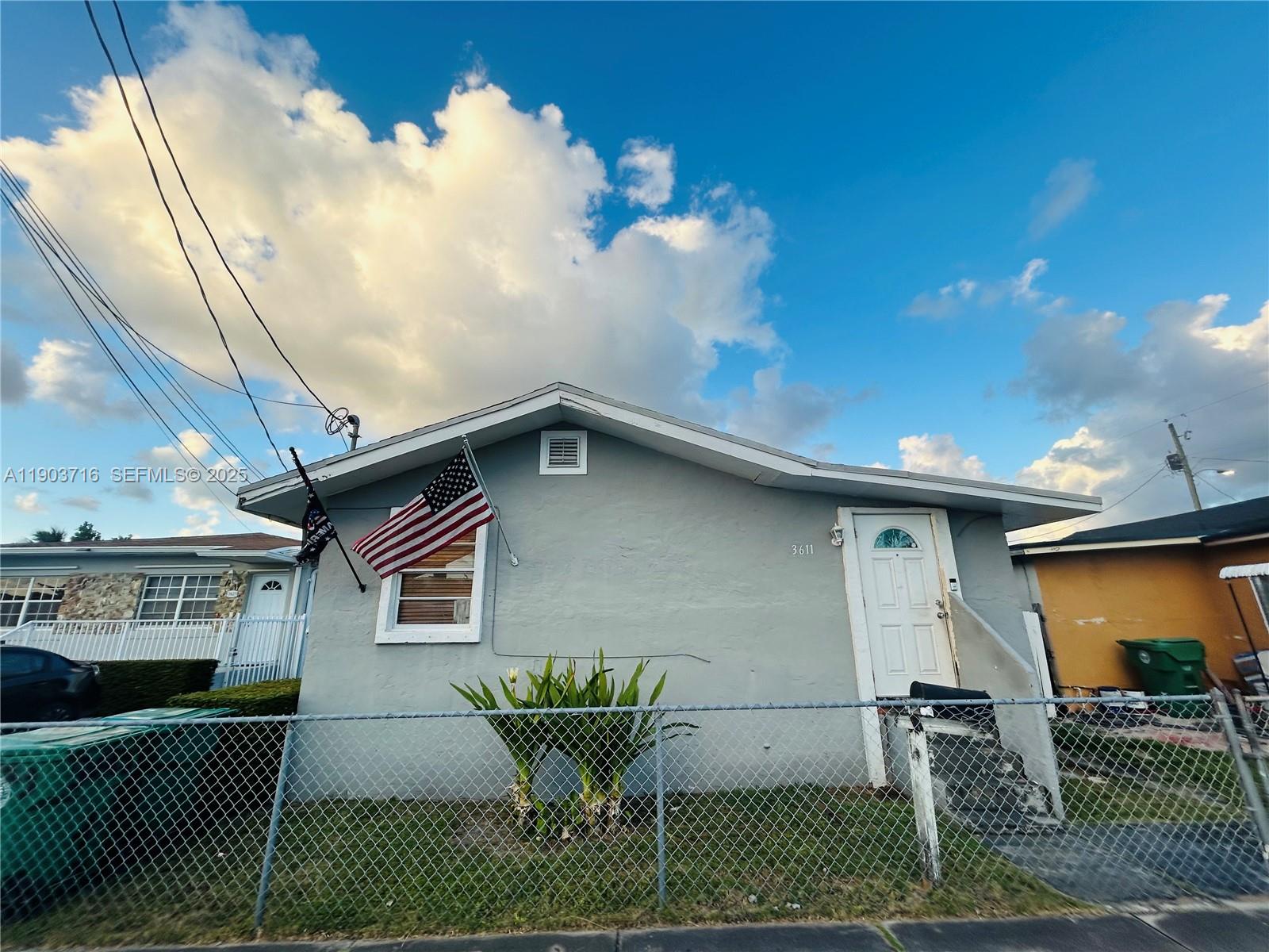 244 Southwest 36th Avenue Miami, FL 33135 - Photo 15 of 17 a view of a chairs and table in the patio