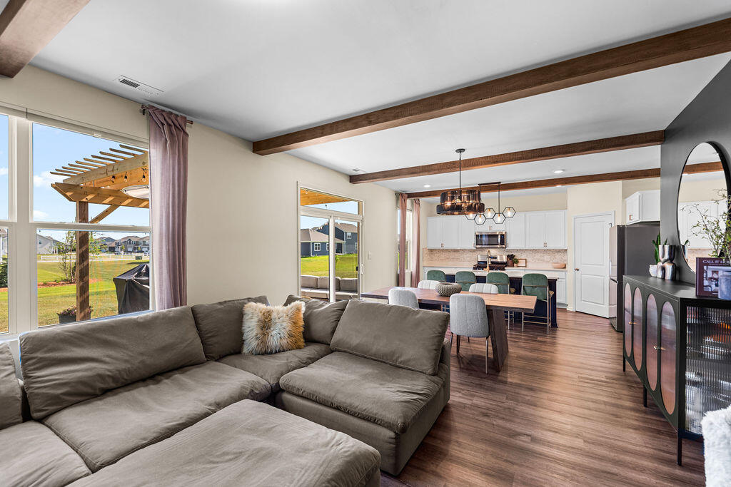 7900 West 105th Place Crown Point, IN 46307 - Photo 12 of 33 a living room with furniture and a large window