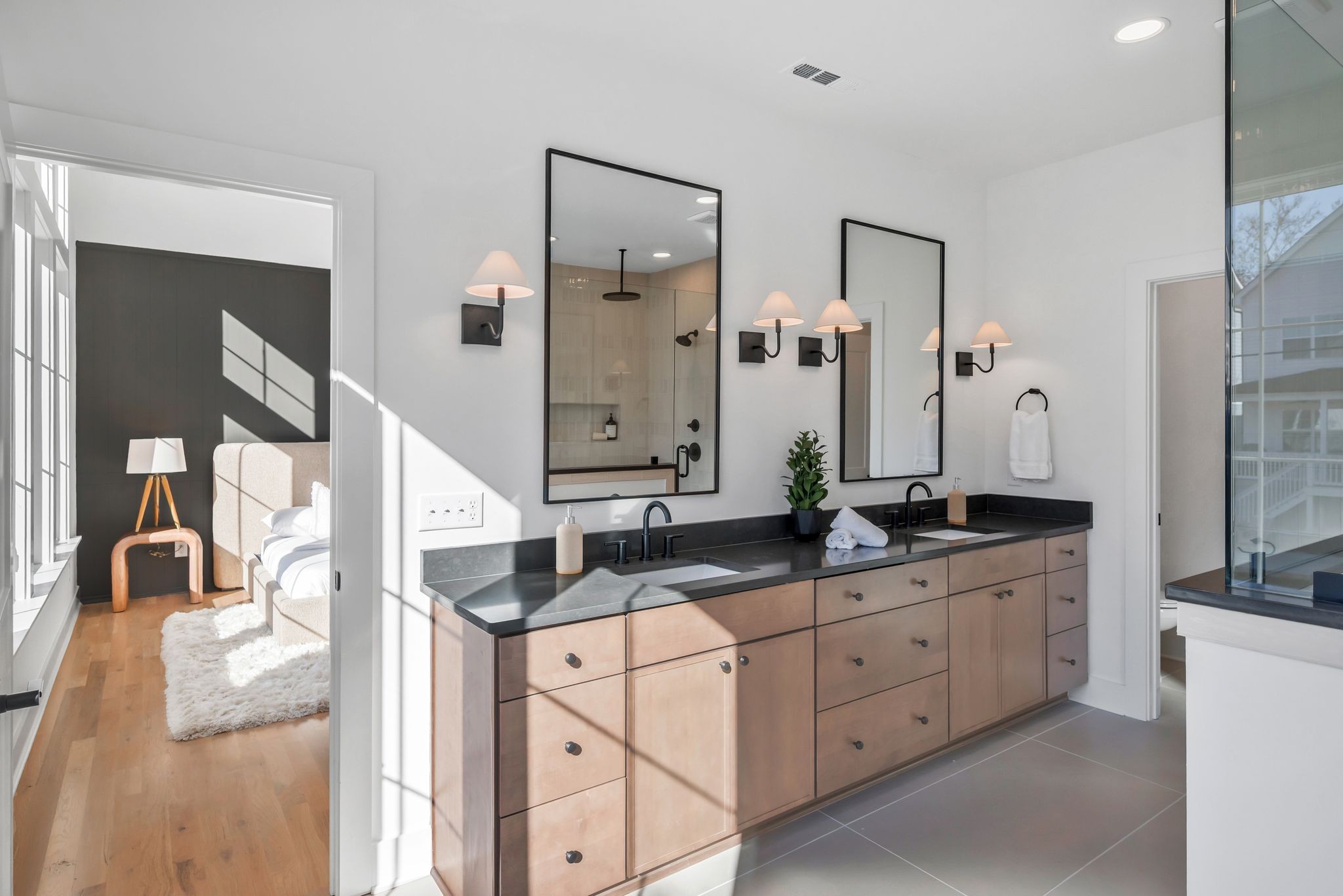 605 A American Road Nashville, TN 37209 - Photo 14 of 36 a bathroom with double sink and a mirror