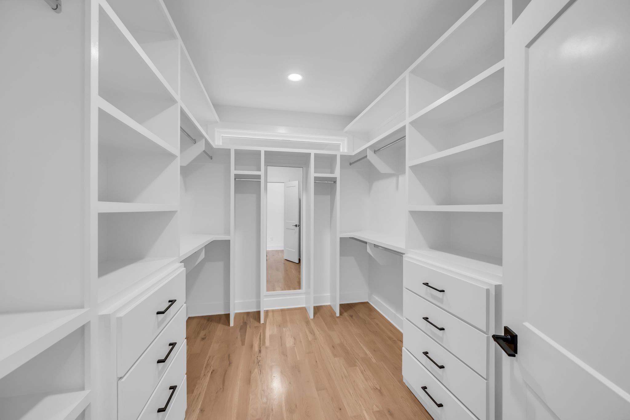 605 A American Road Nashville, TN 37209 - Photo 18 of 36 a view of walk in closet with empty racks