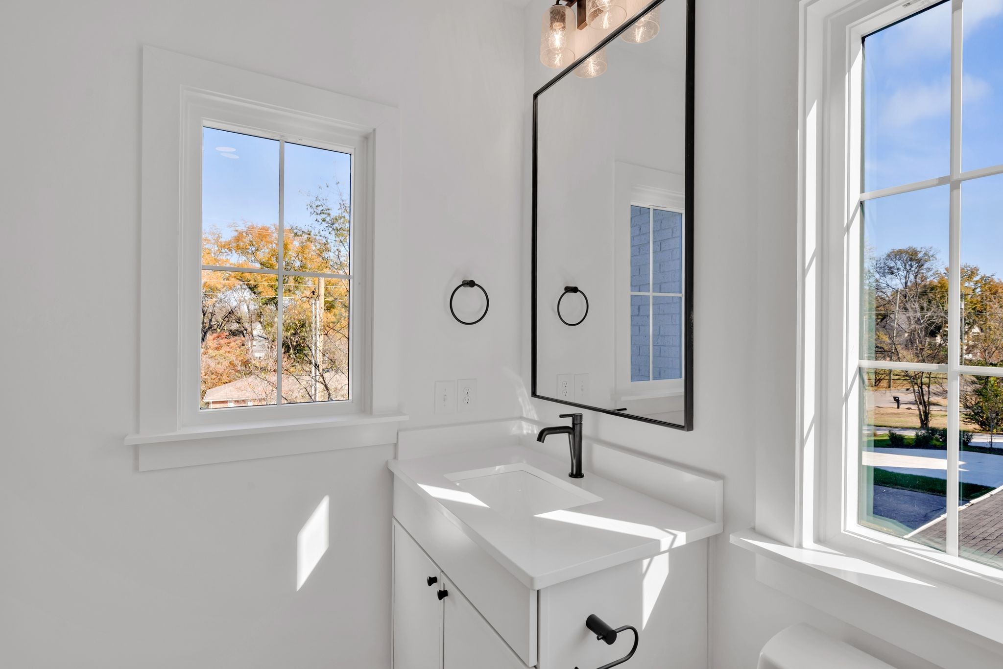 605 A American Road Nashville, TN 37209 - Photo 22 of 36 a bathroom with a sink and a mirror