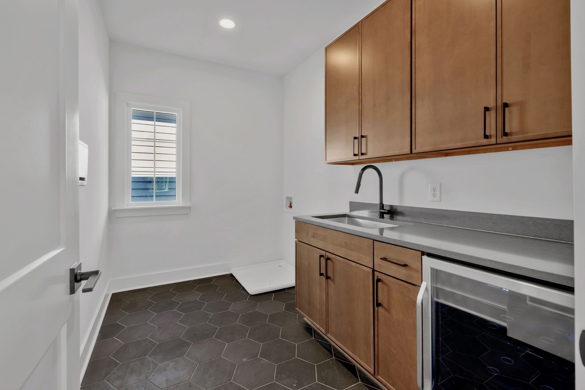 605 A American Road Nashville, TN 37209 - Photo 23 of 36 a kitchen with sink and cabinets