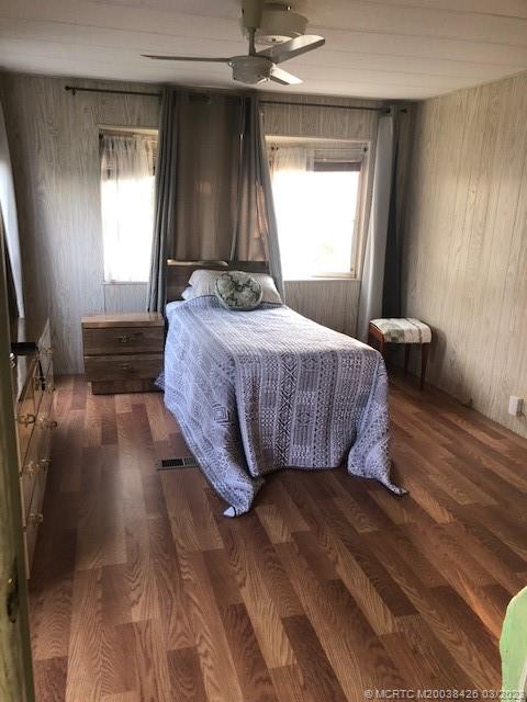 21 Los Lagos Road Port St. Lucie, FL 34952 - Photo 15 of 25 a bedroom with a bed and window