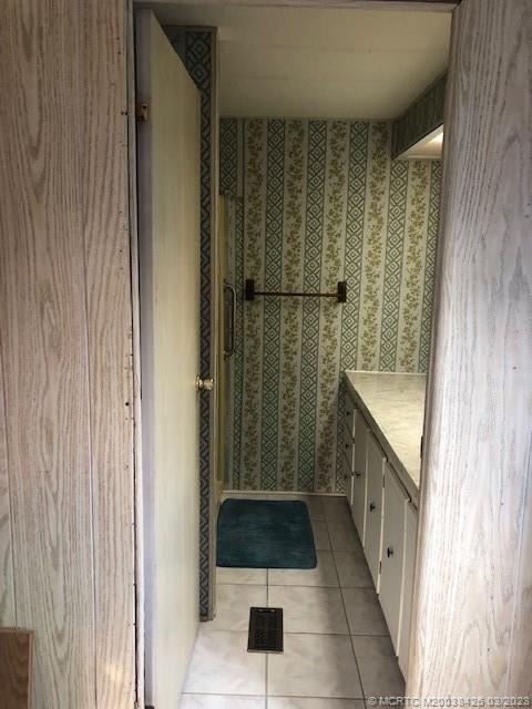 21 Los Lagos Road Port St. Lucie, FL 34952 - Photo 16 of 25 a bathroom with a shower