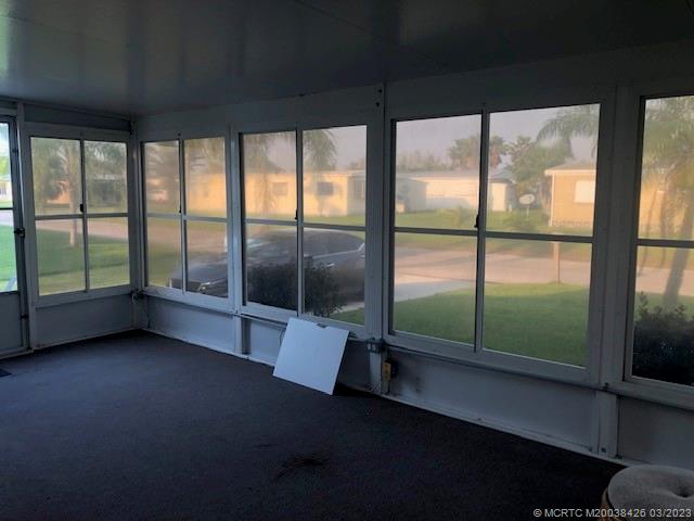 21 Los Lagos Road Port St. Lucie, FL 34952 - Photo 24 of 25 a view of empty room with windows
