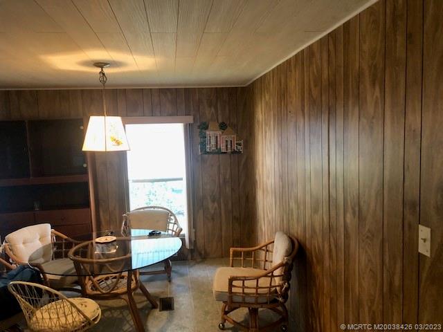 21 Los Lagos Road Port St. Lucie, FL 34952 - Photo 6 of 25 a room with furniture and window