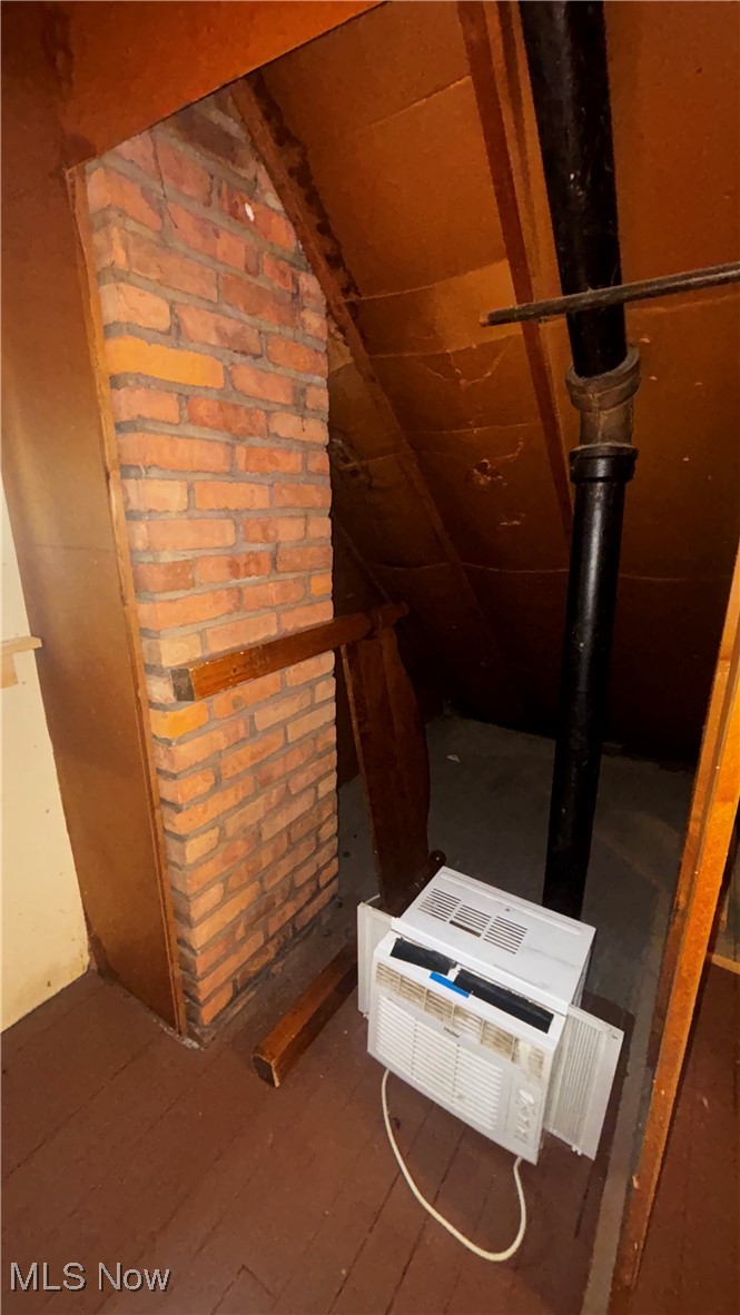 15710 Hazel Road Cleveland, OH 44112 - Photo 34 of 44 Detailed view of wood finished floors and heating unit