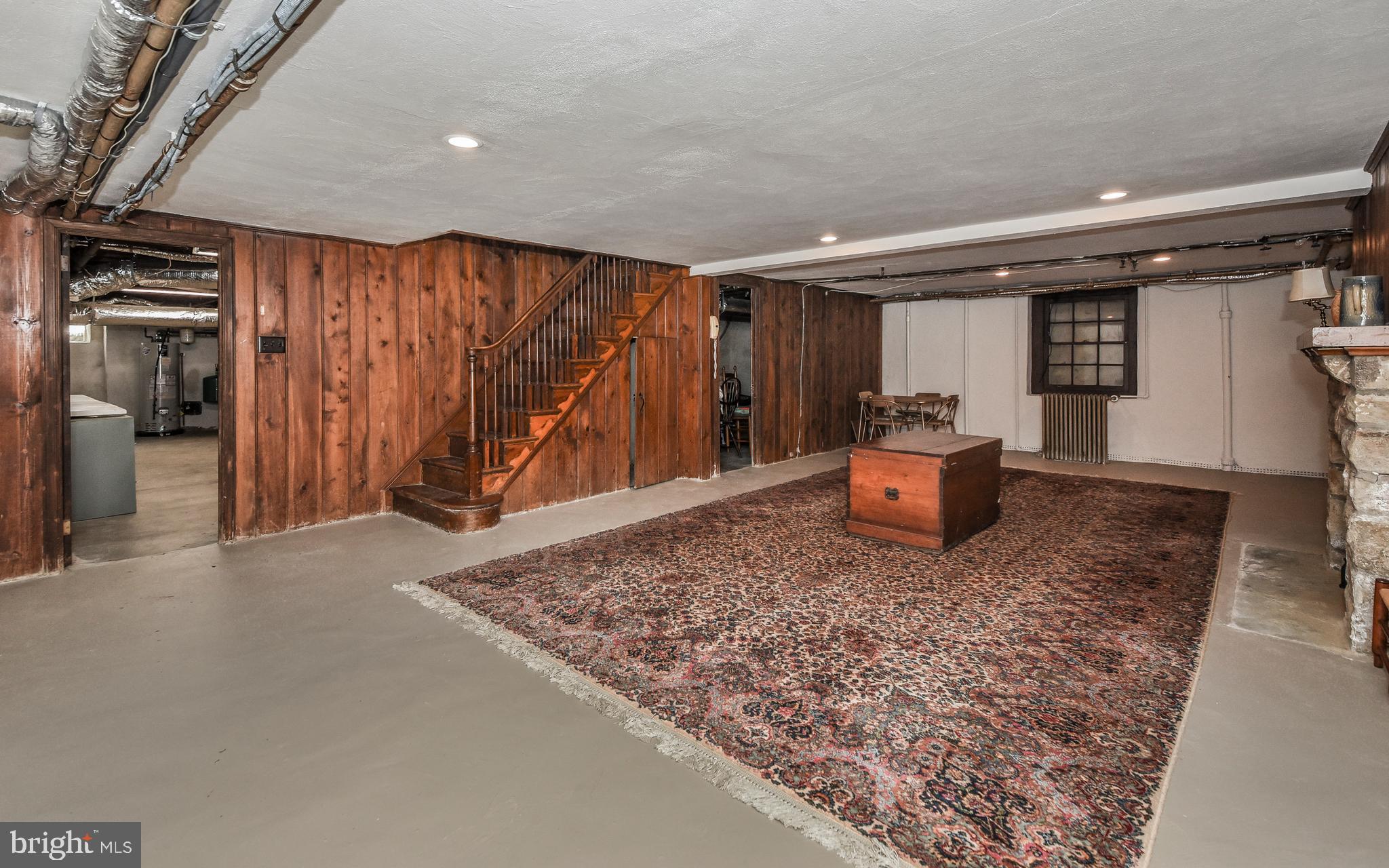 407 Newbold Road Jenkintown, PA 19046 - Photo 34 of 45 Finished Basement With Stone Fireplace