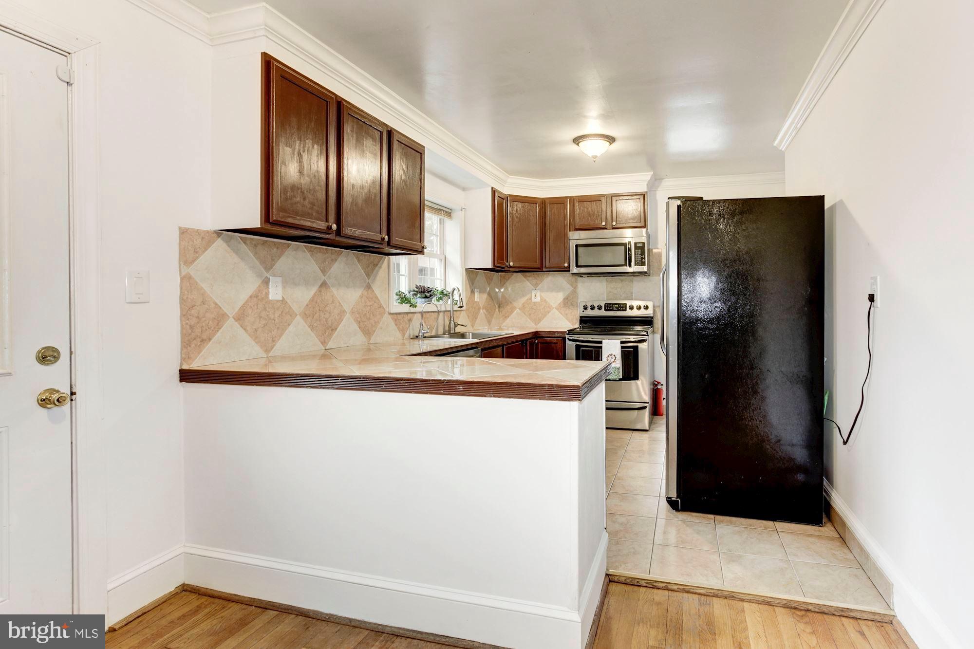 901 Ficklen Road Fredericksburg, VA 22405 - Photo 13 of 38 Space for your kitchen table off of the kitchen.
