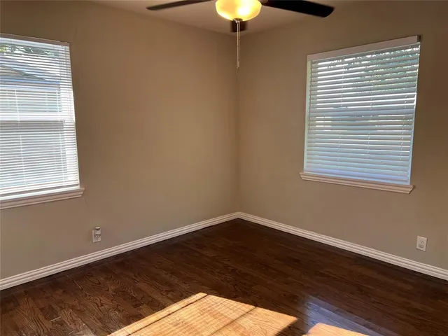 a view of a room that has a window in it