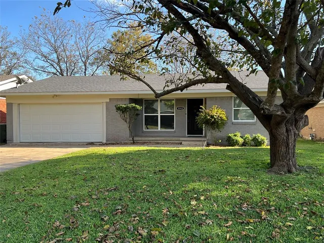 a house view with a garden space