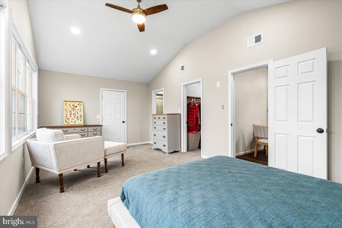 2816 Ballenger Creek Pike Frederick, MD 21703 - Photo 16 of 38 a bed room with a bed and furniture