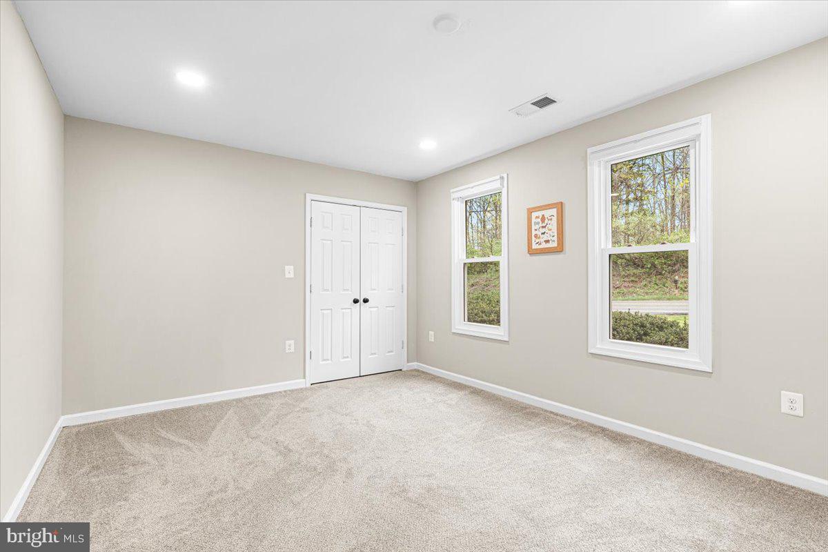 2816 Ballenger Creek Pike Frederick, MD 21703 - Photo 25 of 38 an empty room with a window