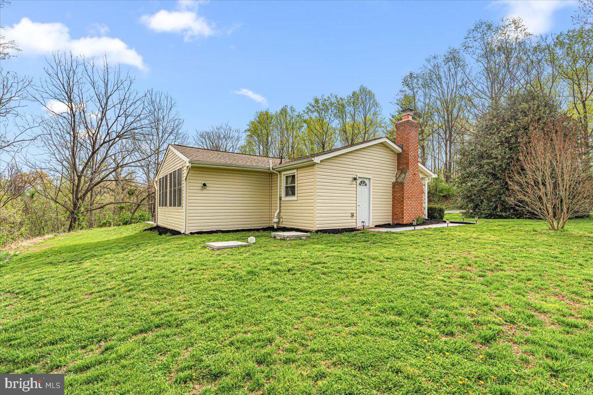 2816 Ballenger Creek Pike Frederick, MD 21703 - Photo 31 of 38 a view of a backyard with a garden