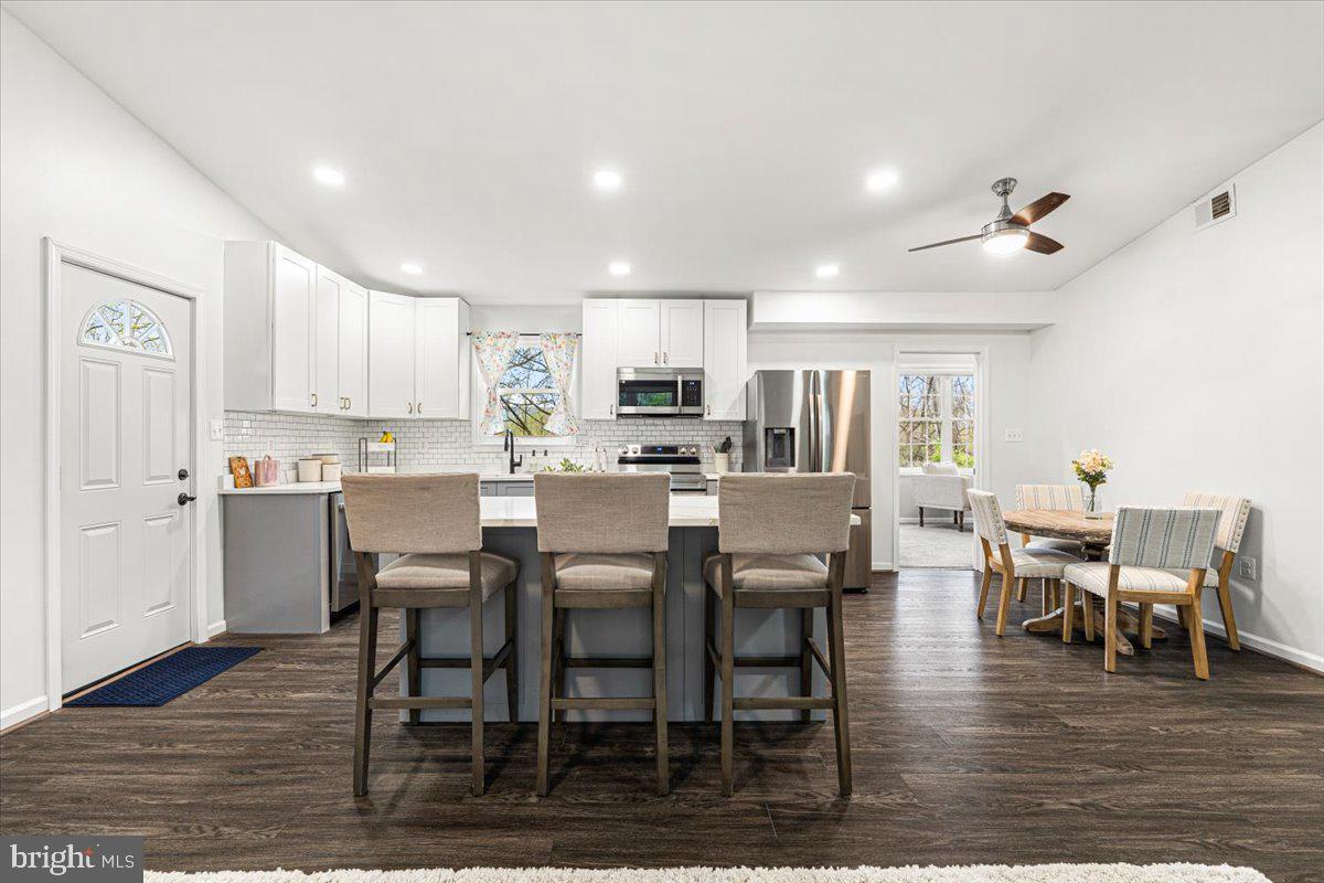 2816 Ballenger Creek Pike Frederick, MD 21703 - Photo 6 of 38 a view of a dining room with furniture