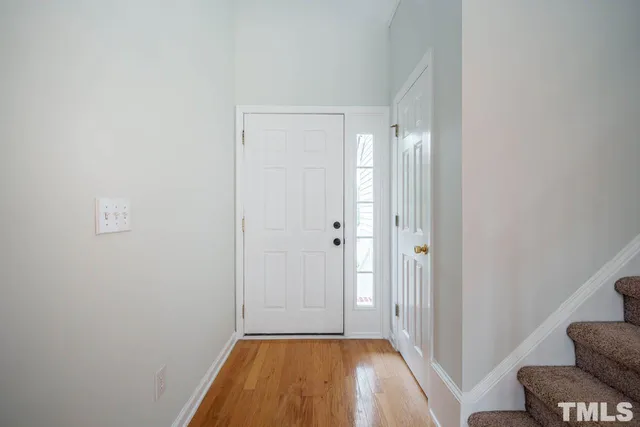a view of a livingroom with a hardwood and floor