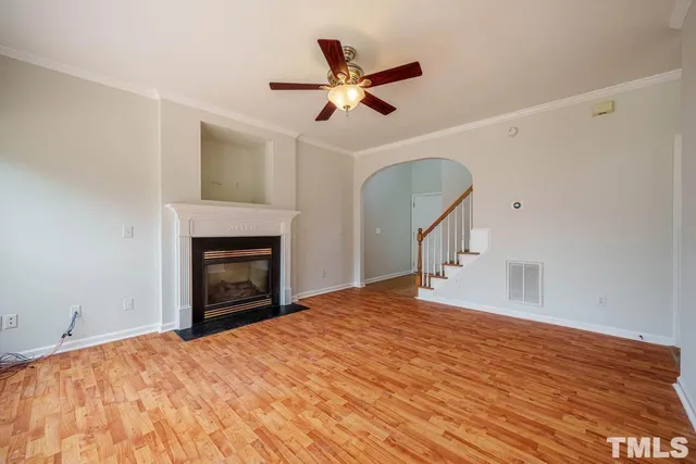 a bedroom with a bed and a fireplace
