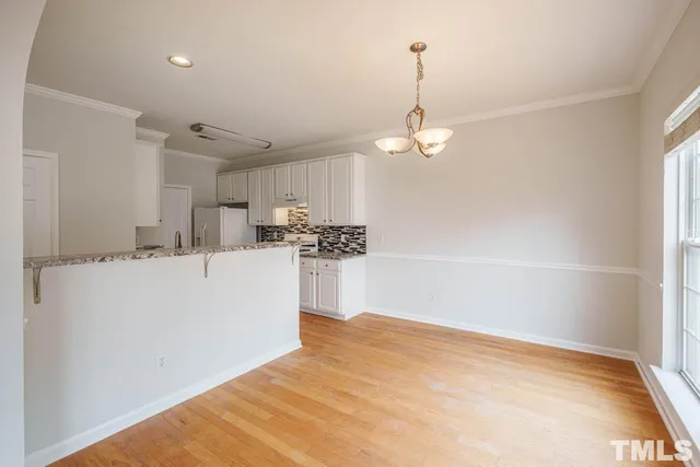 a view of a kitchen with a sink and dishwasher