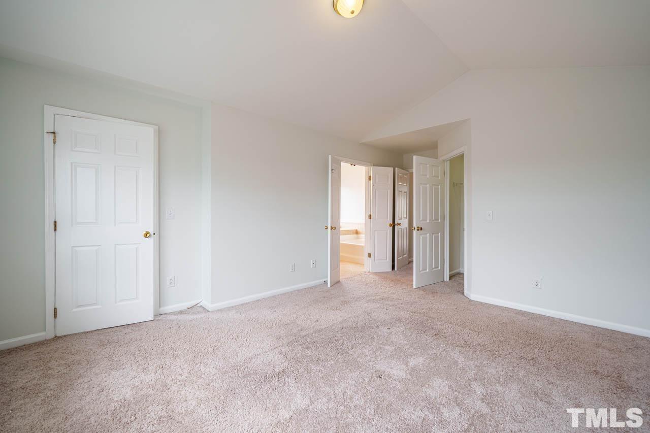 4705 Delta Vision Court, Unit (ID 12461041) Raleigh, NC 27612 - Photo 24 of 35 a view of an empty room and closet area