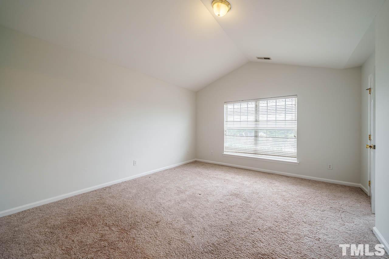 4705 Delta Vision Court, Unit (ID 12461041) Raleigh, NC 27612 - Photo 30 of 35 an empty room with a empty space and windows