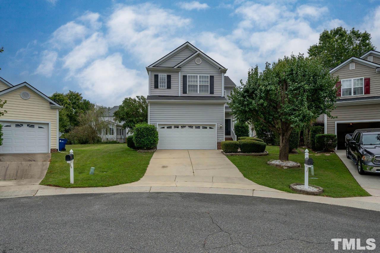 4705 Delta Vision Court, Unit (ID 12461041) Raleigh, NC 27612 - Photo 3 of 35 a front view of a house with a yard and garage