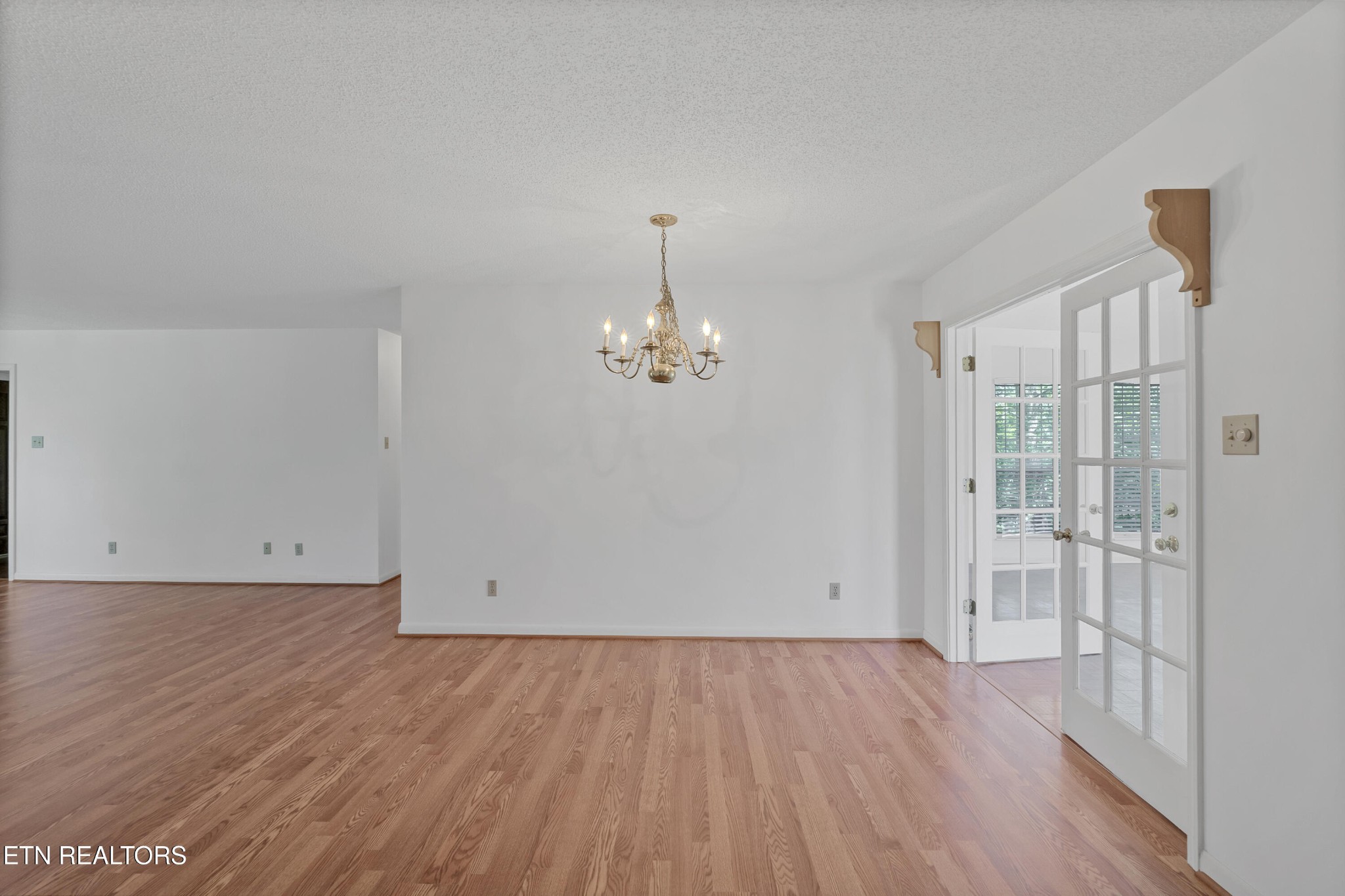 2036 Little Best Road Maryville, TN 37803 - Photo 10 of 54 wooden floor in an empty room with a window